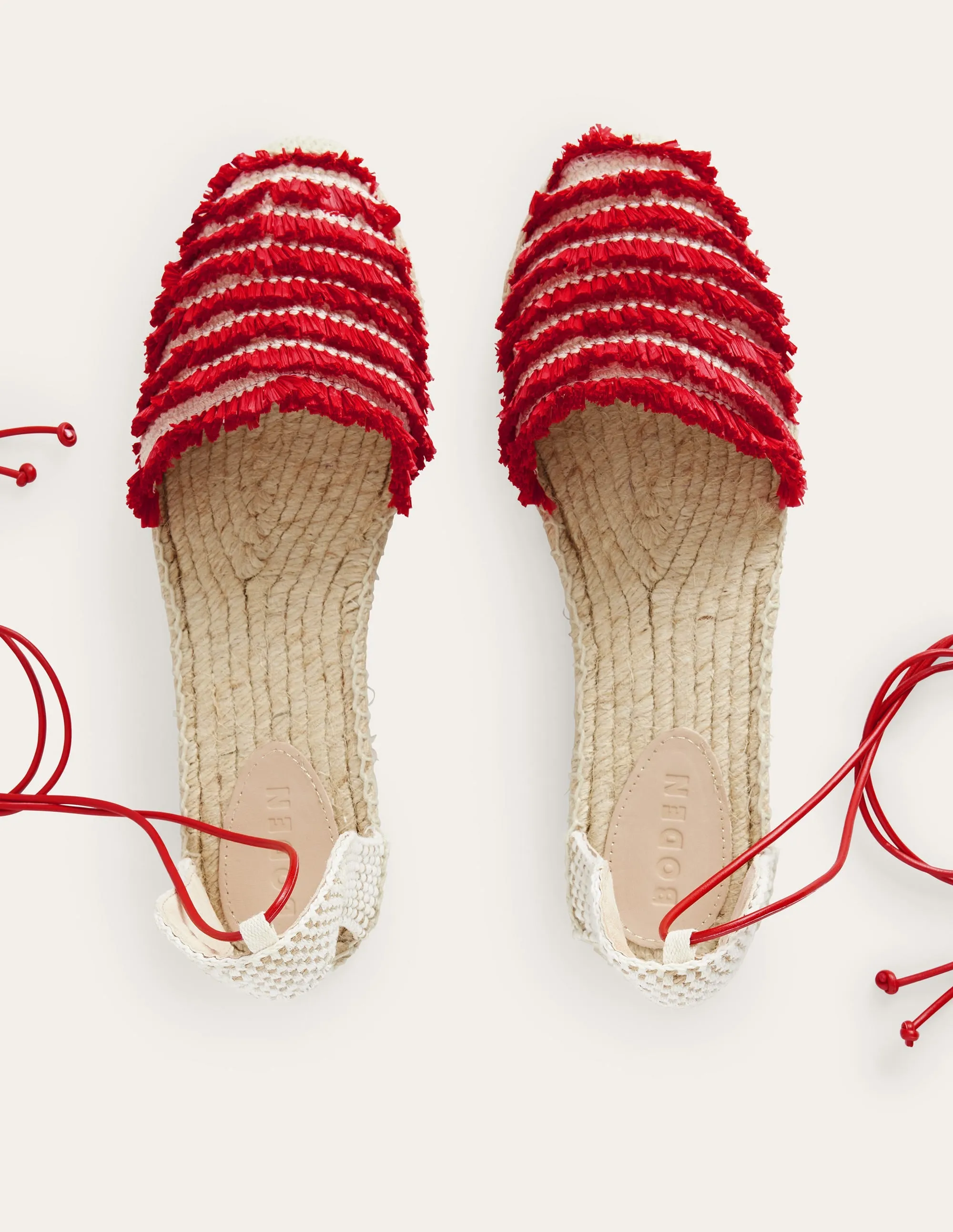 Flache Espadrilles mit Fransen-Zinnoberrot